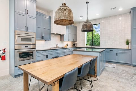 Spacious kitchen with bar seating