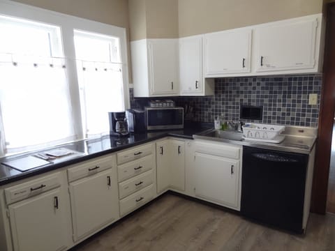 Kitchen 2 coffee pots. 1 Keurig and 1 regular