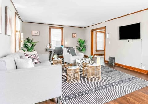 (Main Floor) 50" TV pictured replaced with 65".  A loveseat has also been added