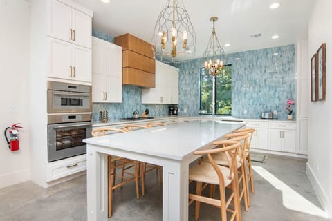 Spacious kitchen with island bar seating