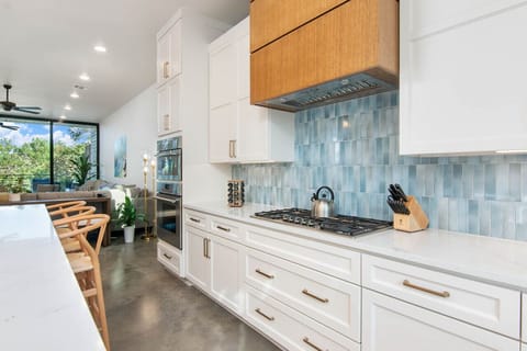 Spacious kitchen with gas stove