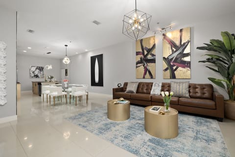 Open concept Living Area leads to the Dining and Kitchen Areas
