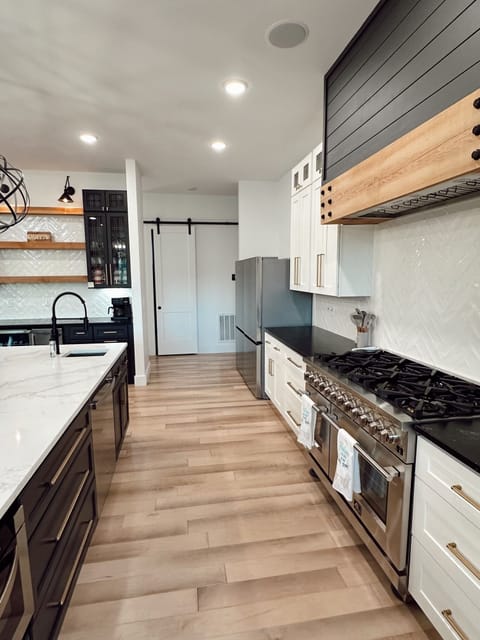 Microwave Drawer and 2nd Dishwasher in Island. 60" of Refrigerator and Freezer.