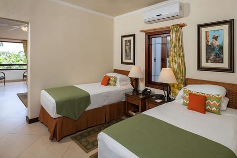 Unit with Twin beds. Exact unit will be assigned upon arrival. Views, colors and decor may vary.
