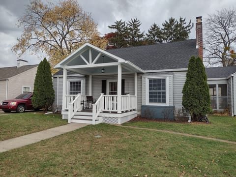 Our home - with a new porch! Park up to 3 cars in the driveway, and 2 on street