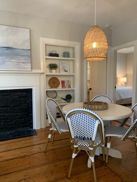Dining room with building book shelves with lots of good Summer reads :)