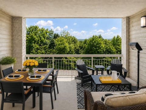 Step out onto your own private balcony, where a table for six invites long dinners and comfy lounge furniture makes it easy to linger. You'll want to spend as much time outside as in