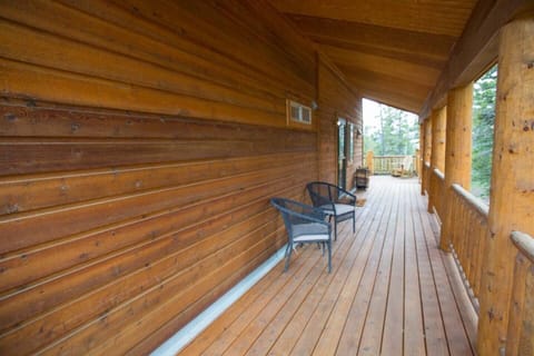 The covered part of the wrap around deck has seating as well