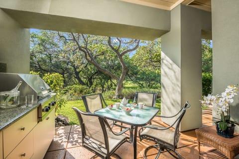 Start your day soaking up the morning light on your private lanai, surrounded by lush trees and serene greenbelt views.