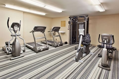 Keep your routine going in the on-site fitness room.