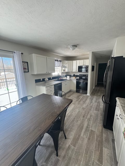 Fully stocked Kitchen with eat-in dining room.
