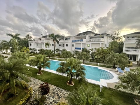 Pool view from upper balcony.  Condo is pool front.  