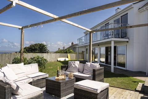 Entertaining from decked area in the garden.