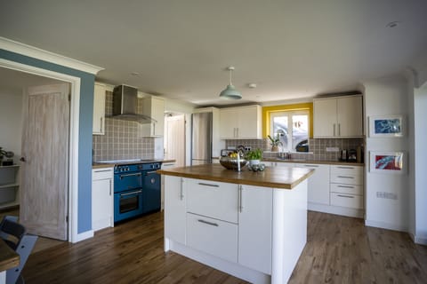 Kitchen with utility room attached.