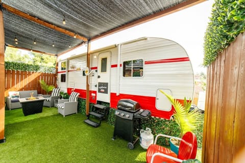 Enjoy your private patio area equipped with firepit, grill, and furniture