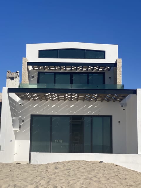 Ocean side of the house. Two patio upper and lower looking directly at ocean