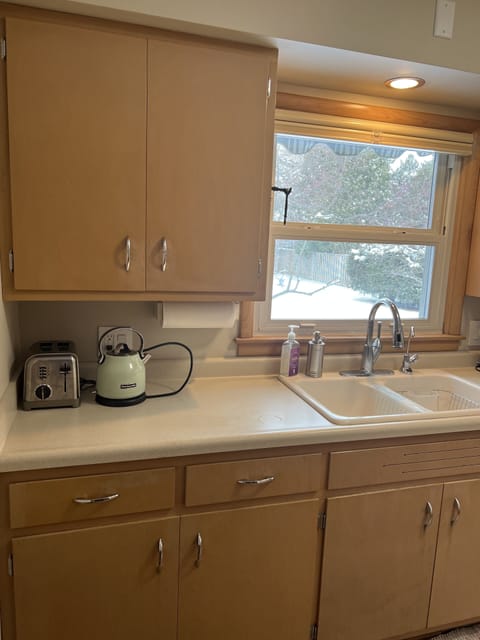 Fully Equipped Kitchen. We kept the original 1950's charm. Clean and stocked!