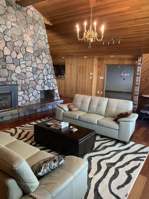 outstanding woodwork and vaulted ceilings with overlook of the sunset