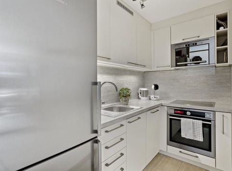 Cabinetry, Countertop, Building, Kitchen Stove, Kitchen Appliance, Home Appliance, Kitchen, Drawer, Flooring, Interior Design