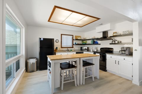 Kitchen is fully stocked with pots, pans, dishware, etc. for your home cooked meals!