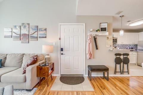 Open entryway with hooks for your personal items, bench & umbrella-just in case!