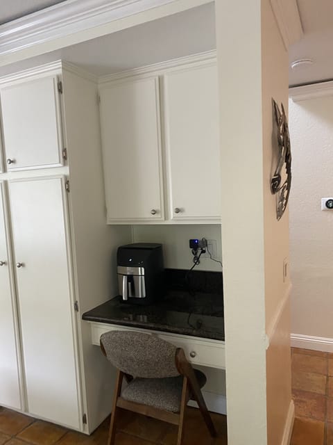 Second floor desk in kitchen.