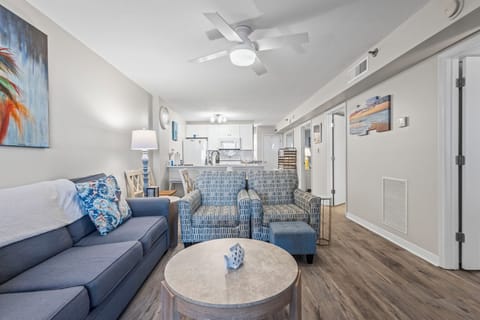 Open-concept layout offers seamless flow from kitchen to dining to living space.