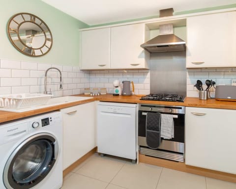 Fully equipped kitchen. Prepare meals easily during your stay.