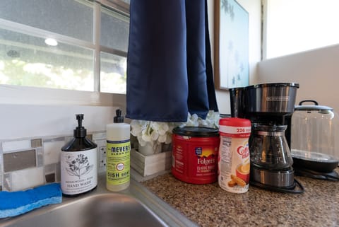 coffee machine, toaster, water boiler, utensils, coffee, coffee filter, creamer