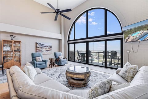 Dramatic Gulf-Front Living Area with Soaring Arched Windows