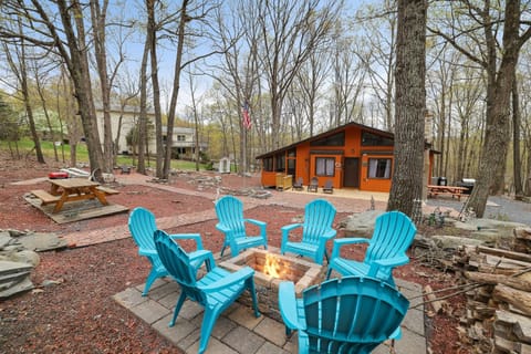 Large area for outside entertainment, grill, smoker, outdoor fire pit and plenty of outside seating! 