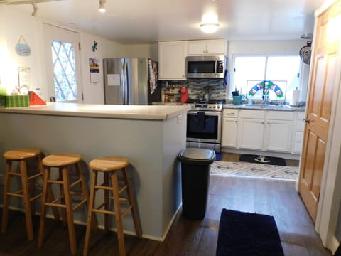 Kitchen view. Refrigerator with ice maker!