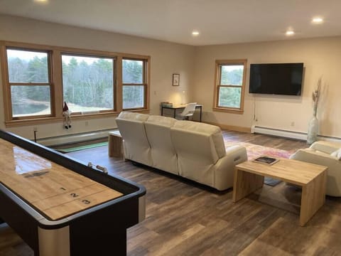 Large living room overlooking the pond