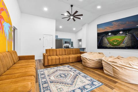 Game Room with 150-inch Screen open to Heated Salt Water Pool