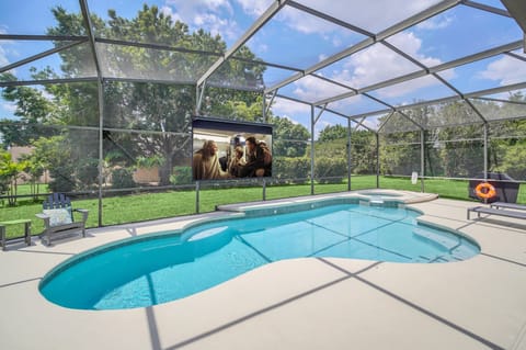 Enjoy The Sunshine In Our Heated South Facing Pool Watching Your Favorite Movie On Our  120" Poolside Theatre
