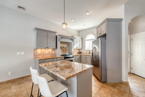 Gather around the island for family meals and good conversation.