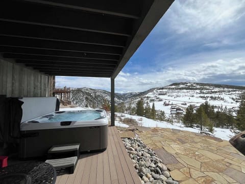 Relax in our private hot tub with breathtaking views!