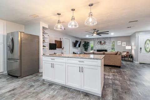 Open Concept to engage with everyone in your party.