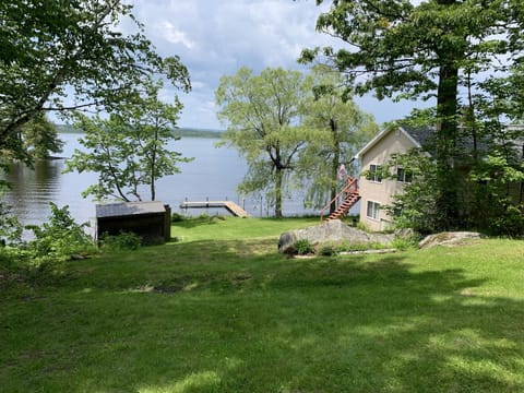 Lakefront property with private yard & dock.