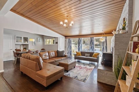 Main living room with open concept to kitchen and dining. Lots of natural light!