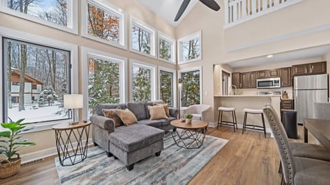 【Living + Dining Area】Large two story stacked windows light up the space for all your family