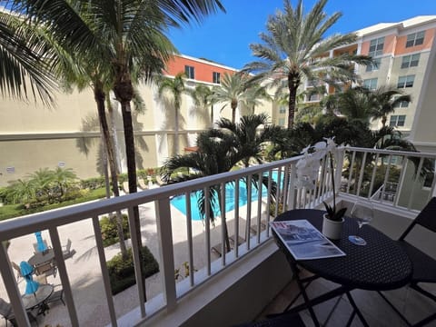 Beautiful view of pool and courtyard from private balcony
