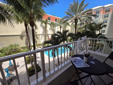Beautiful view of pool and courtyard from private balcony