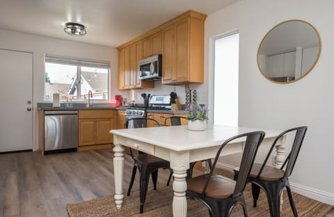 4 seats for the dining room table and extra seating in the backyard.