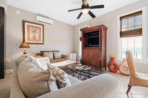 Studio living space with a sleeper sofa and TV (sleeps 2)