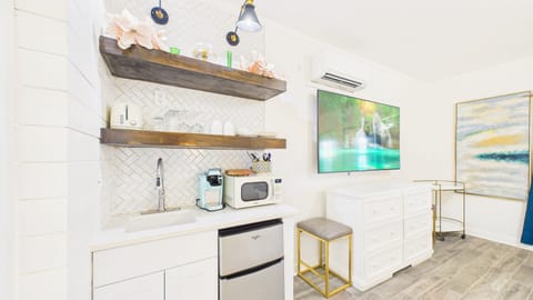 Kitchenette with basic dining and coffee essentials