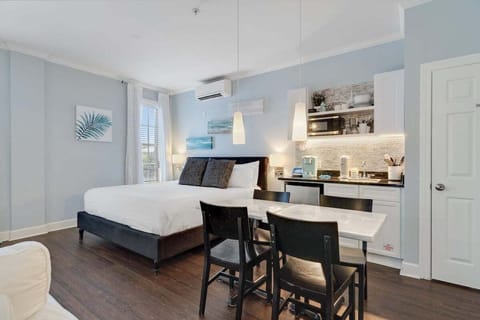 King size bed and dining area