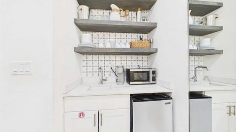 Kitchenette with microwave and under counter refrigerator