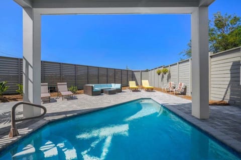 Pool and fenced back yard