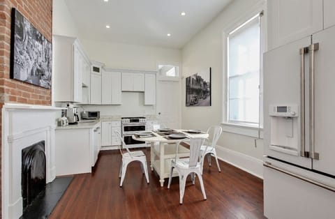 Spacious kitchen with stainless steel appliances. For cooking and entertainment.